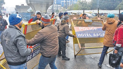 BJP workers sat on a dharna blocking Ferozepur road after a man hurled abuses at their protest outside the Ludhiana mini secretariat. (HT File) BJP workers sat on a dharna blocking Ferozepur road after a man hurled abuses at their protest outside the Ludhiana mini secretariat. (HT File)