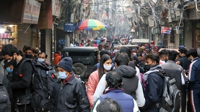 People flout social distancing norms at Chandni Chowk market in Delhi on Friday. (ANI) People flout social distancing norms at Chandni Chowk market in Delhi on Friday. (ANI)