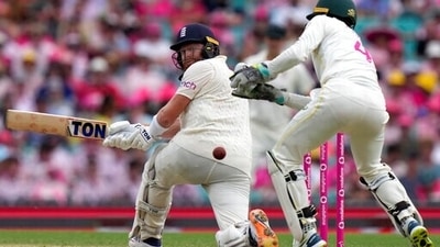 England's Jonny Bairstow sweeps the ball past Australia's Alex Carey during the third day of their Ashes cricket test match in Sydney, Friday, Jan. 7, 2022. (AP) England's Jonny Bairstow sweeps the ball past Australia's Alex Carey during the third day of their Ashes cricket test match in Sydney, Friday, Jan. 7, 2022. (AP)