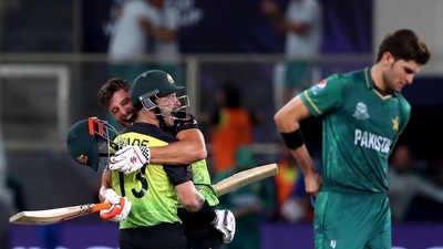 Pakistan's Shaheen Afridi, right, reacts as Australia's Matthew Wade, left, and Marcus Stoinis celebrate their win in the Cricket Twenty20 World Cup semi-final (AP) Pakistan's Shaheen Afridi, right, reacts as Australia's Matthew Wade, left, and Marcus Stoinis celebrate their win in the Cricket Twenty20 World Cup semi-final (AP)