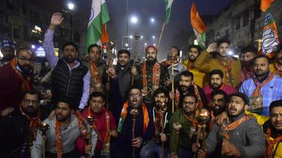 Amritsar, India – January 6, 2022: Bharatiya Janata Yuva Morcha (BJYM) members hold torches as they shout slogans during a protest against Punjab Government over the Prime Minister Narendra Modi’s Security Breach in Ferozepur in Amritsar, India, on Thursday, January 6, 2022. (Photo by Sameer Sehgal/Hindustan Times) Amritsar, India – January 6, 2022: Bharatiya Janata Yuva Morcha (BJYM) members hold torches as they shout slogans during a protest against Punjab Government over the Prime Minister Narendra Modi’s Security Breach in Ferozepur in Amritsar, India, on Thursday, January 6, 2022. (Photo by Sameer Sehgal/Hindustan Times)