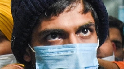 Neeraj Bishnoi, one of the main conspirator in the 'Bulli Bai' case, arrives at IGI airport after being arrested by Delhi Police Special Cell from Assam, in New Delhi on Thursday. (ANI) Neeraj Bishnoi, one of the main conspirator in the 'Bulli Bai' case, arrives at IGI airport after being arrested by Delhi Police Special Cell from Assam, in New Delhi on Thursday. (ANI)