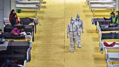 Health workers in PPE overalls at the isolation centre in CWG Village, Akshardham, in New Delhi on Friday. (Amal KS/ HT Photo) Health workers in PPE overalls at the isolation centre in CWG Village, Akshardham, in New Delhi on Friday. (Amal KS/ HT Photo)
