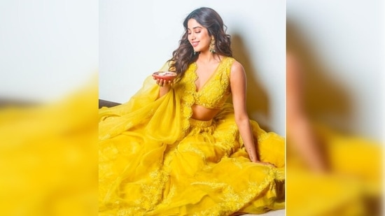 Janhvi Kapoor looks like a dream in this Nargi Darya lehenga set. The outfit costs <span class='webrupee'>₹</span>1,90,000/-, according to the label's official website.(Instagram/@tanghavri)