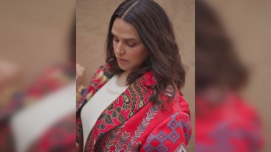 For her hairdo, Neha Dhupia opted for soft beachy waves and wore minimal makeup.(Instagram/@nehadhupia)