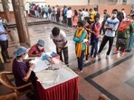 Vaccination going on at a centre in Navi Mumbai on Saturday. (PTI)