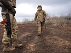 Ukrainian marines walk at the line of separation from pro-Russian rebels, Donetsk region, Ukraine. Ukrainian marines walk at the line of separation from pro-Russian rebels, Donetsk region, Ukraine.