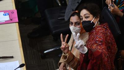 BJP councillor Sarabjit Kaur Dhillon , with party MP Kirron Kher, gestures victory symbol after winning the Chandigarh mayor election at the municipal corporation House in Chandigarh on Saturday. (Ravi Kumar/HT photo) BJP councillor Sarabjit Kaur Dhillon , with party MP Kirron Kher, gestures victory symbol after winning the Chandigarh mayor election at the municipal corporation House in Chandigarh on Saturday. (Ravi Kumar/HT photo)