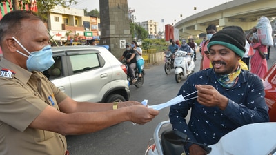Checking of Covid-appropriate behaviour going on in Karad, Maharashtra. (PTI) Checking of Covid-appropriate behaviour going on in Karad, Maharashtra. (PTI)