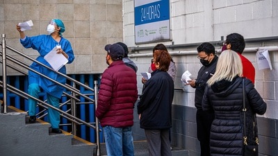 A healthcare worker delivers Covid-19 test results in Mexico City, Mexico, on January 6. (Bloomberg Photo) A healthcare worker delivers Covid-19 test results in Mexico City, Mexico, on January 6. (Bloomberg Photo)
