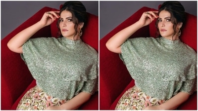 Styled by hair stylist Babita Bose, Zareen wore her hair in a messy bun with a middle part. (Instagram/@zareenkhan)