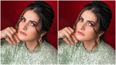 Assisted by makeup artist Niccky Rajaani, Zareen opted for a minimal makeup look to complement her attire. (Instagram/@zareenkhan)