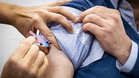 It was unclear whether Evrard, who was 76 had refused to be vaccinated himself.. (AFP)