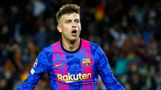 Barcelona's Gerard Pique celebrates after scoring his side's first goal during a Champions League group E football match between F.C. Barcelona and Dinamo Kyiv.(AP)