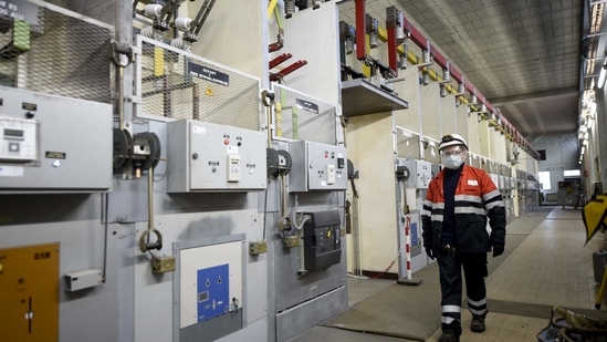 As employee of multi-metals Nyrstar is seen at one of the plants of the company in Auby, Northern France. The IHU variant was discovered by researchers from France's Méditerranée Infection.(AFP Photo)