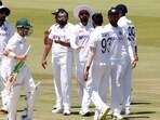 India's Jasprit Bumrah celebrates after taking the wicket of South Africa's Dean Elgar with teammates.(REUTERS)