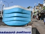 A giant statue of a face mask in Chennai, India.&nbsp;