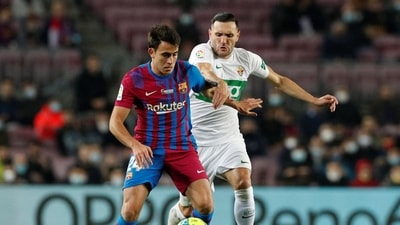 FC Barcelona's Eric Garcia in action with Elche's Lucas Perez&nbsp; (REUTERS)