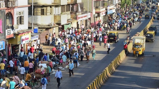 People visit a crowded Dadar market on Sunday. (PTI)