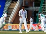 India's bowler Jasprit Bumrah, center, reacts as South Africa's batsman Keegan Petersen, right, and captain Dean Elgar, run between the wickets during the first day of the 2nd Test Cricket match between South Africa and India at the Wanderers stadium in Johannesburg, South Africa, Monday, Jan. 3, 2022.(AP)