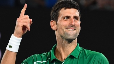 (FILES) This file photo taken on January 30, 2020 shows Serbia's Novak Djokovic celebrating after beating Switzerland's Roger Federer during their men's singles semi-final match on day 11 of the Australian Open tennis tournament in Melbourne. - World number one Novak Djokovic won a stunning victory on January 10, 2022 over the Australian government, overturning the cancellation of his visa on Covid-19 health grounds, and ending his detention. (Photo by William WEST / AFP) / -- IMAGE RESTRICTED TO EDITORIAL USE - STRICTLY NO COMMERCIAL USE -- (AFP)