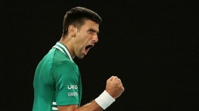 Serbia's Novak Djokovic celebrates winning the third set during his quarter final match against Germany's Alexander Zverev&nbsp; (REUTERS)