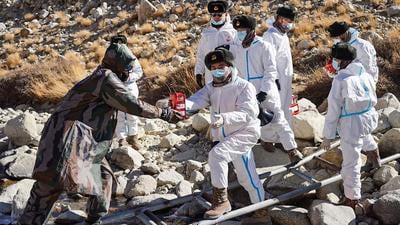 **EDS: HANDOUT PHOTO MADE AVAILABLE FROM INDIAN ARMY ON SUNDAY, JAN. 2, 2022** New Delhi: India and Chinese troops exchanged sweets and greetings at 10 border posts along the Line of Actual Control (LAC) including in eastern Ladakh to mark the New Year, on Saturday, Jan. 1, 2022. (PTI Photo)(PTI01_02_2022_000030A) (PTI)
