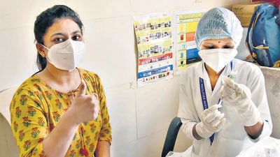 Health workers, frontline staff and citizens above 60 years of age who have taken two doses of the vaccine have started getting booster doses from Monday. (HT PHOTO)