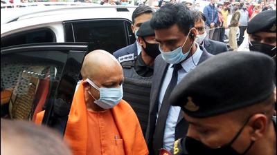 Lucknow, Jan 10 (ANI): Uttar Pradesh Chief Minister Yogi Adityanath arrives to attend the party meeting in view of UP assembly election 2022, at BJP headquarters, in Lucknow on Monday. (ANI Photo) (Naeem Ansari) Lucknow, Jan 10 (ANI): Uttar Pradesh Chief Minister Yogi Adityanath arrives to attend the party meeting in view of UP assembly election 2022, at BJP headquarters, in Lucknow on Monday. (ANI Photo) (Naeem Ansari)