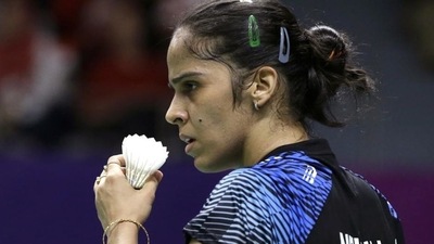 Saina Nehwal in action during Asian Games 2018 semifinal match against Tai Tzu Ying. (AP) Saina Nehwal in action during Asian Games 2018 semifinal match against Tai Tzu Ying. (AP)
