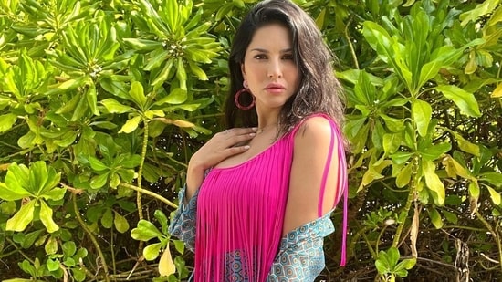 Taking her grip from social media, Sunny shared a series of photos from her vacation in the Maldives where she can be seen donning a single strap monokini that was fringed along the dark pink neckline to add to the oomph factor and layered down. on a blue printed background.  (Instagram / sunnyleone)