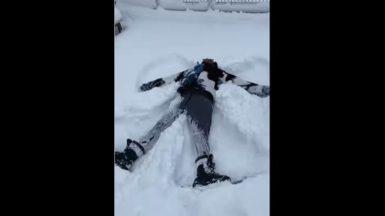 The man happily making the first snow angel of his life.&nbsp;(instagram/@lingandlamb)