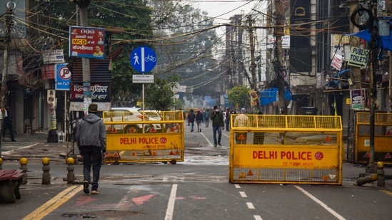 The red alert is sounded when Covid-19 positivity goes beyond five per cent and stays above it for two consecutive days.(PTI) The red alert is sounded when Covid-19 positivity goes beyond five per cent and stays above it for two consecutive days.(PTI)