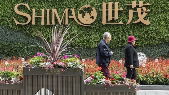Shimao unit Shanghai Shimao Construction said on Friday that it was in talks with China Credit Trust to resolve a $101 million defaulted loan payment.(Bloomberg)