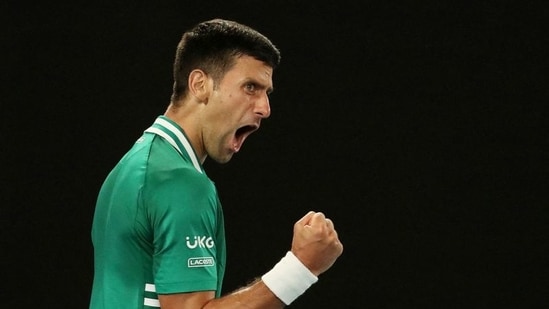 Serbia's Novak Djokovic celebrates winning the third set during his quarter final match against Germany's Alexander Zverev&nbsp;(REUTERS)