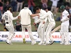 Ross Taylor of New Zealand celebrates a wicket and is congratulated by his teammates. (AP) Ross Taylor of New Zealand celebrates a wicket and is congratulated by his teammates. (AP)