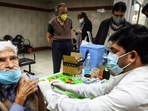 Man getting vaccinated Man getting vaccinated
