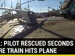 VIRAL: PILOT RESCUED SECONDS BEFORE TRAIN HITS PLANE