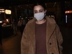 Actor Parineeti Chopra arrived in Mumbai last night, and shutterbugs clicked her getting out of the airport. The star slayed airport fashion in a comfy athleisure fit. She gave us tips on keeping the airport look chic and winter-ready with her choice of ensemble, and we are taking notes.(HT Photo/Varinder Chawla)