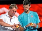 Former Australia cricketer Shane Warne with Novak Djokovic Former Australia cricketer Shane Warne with Novak Djokovic