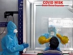 A healthcare worker takes sample of a person for Covid-19 test in Chennai on Monday. A healthcare worker takes sample of a person for Covid-19 test in Chennai on Monday.