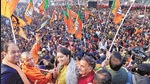 Chief minister Yogi Adityanath, Union minister Smriti Irani and other BJP dignitaries during the ‘Jan Vishwas Yatra’ ahead of UP elections, in Amethi on Monday. (PTI)