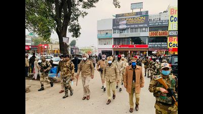 Mohali police officers holding a flag march on Tuesday, ahead of the Punjab assembly elections. (HT Photo) Mohali police officers holding a flag march on Tuesday, ahead of the Punjab assembly elections. (HT Photo)
