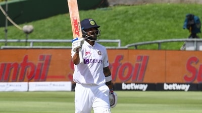 India's Virat Kohli celebrates after scoring a half-century.&nbsp;