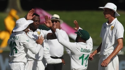 Cricket - Third Test - South Africa v India - Newlands Cricket Ground, Cape Town, South Africa - January 11, 2022 South Africa's Kagiso Rabada celebrates after taking the wicket of India's Virat Kohli with teammates REUTERS/Sumaya Hisham (REUTERS)