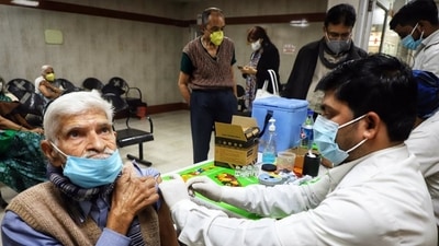 Man getting vaccinated Man getting vaccinated