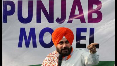 Punjab Congress president Navjot Singh Sidhu interacting with the media in Chandigarh on Tuesday. (Ravi Kumar/HT) Punjab Congress president Navjot Singh Sidhu interacting with the media in Chandigarh on Tuesday. (Ravi Kumar/HT)