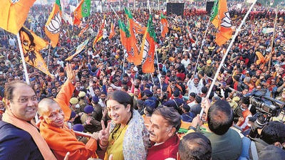 Chief minister Yogi Adityanath, Union minister Smriti Irani and other BJP dignitaries during the ‘Jan Vishwas Yatra’ ahead of UP elections, in Amethi on Monday. (PTI) Chief minister Yogi Adityanath, Union minister Smriti Irani and other BJP dignitaries during the ‘Jan Vishwas Yatra’ ahead of UP elections, in Amethi on Monday. (PTI)