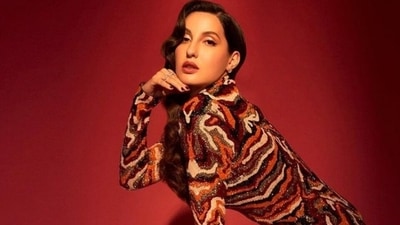 Nora Fatehi teams firecracker look in hourglass-flaunting tiger print mini dress with ₹50k shoes: All pics Nora Fatehi teams firecracker look in hourglass-flaunting tiger print mini dress with ₹50k shoes: All pics