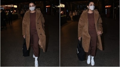 The 33-year-old actor teamed the jumper with a pair of high waisted joggers that came in the same brown shade. The pants featured a skinny fit, and Parineeti teamed them with ribbed white socks. She added a street-style touch by tucking the hem of her pants inside the socks. (HT Photo/Varinder Chawla) The 33-year-old actor teamed the jumper with a pair of high waisted joggers that came in the same brown shade. The pants featured a skinny fit, and Parineeti teamed them with ribbed white socks. She added a street-style touch by tucking the hem of her pants inside the socks. (HT Photo/Varinder Chawla)